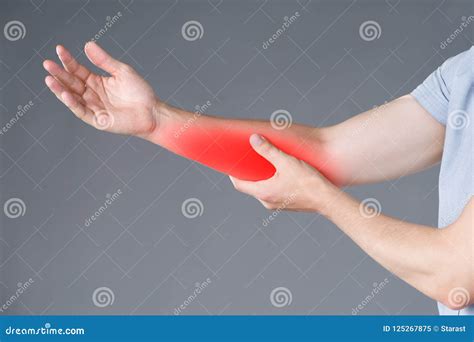 Pain In Forearm Muscle Inflammation Studio Shot On Gray Background