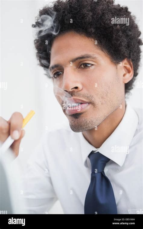 Portrait Of A Businessman Smoking Stock Photo Alamy