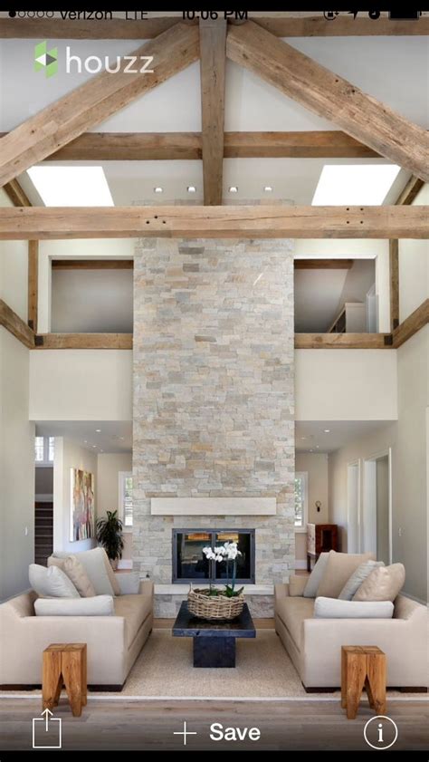 Stylists make it look so easy, but knowing how to decorate a living room—and a small one at that—is easier said than done. Image result for double volume space fireplace | Modern ...