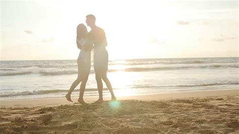 Couple Kissing At Sunset On The Seashore Stock Footage Video 3879152 Shutterstock