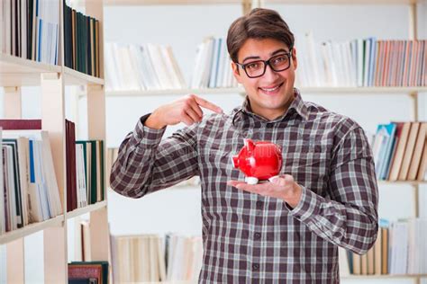 The Young Student In Expensive Textbooks Concept Stock Image Image Of