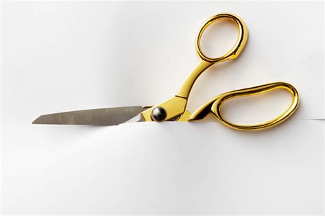 Office Scissors Cutting Through Paper Stock Photo Download Image Now