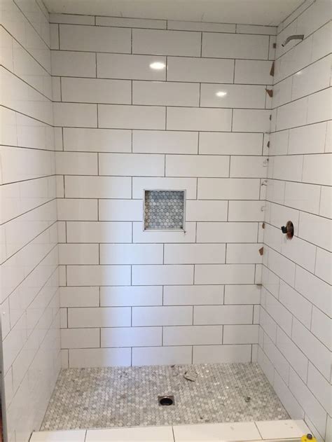 Maybe you would like to learn more about one of these? Large subway tile with mosiac shower pan and niche. | Best ...