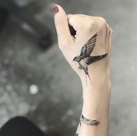 A Bird By Jay Shin Hand Tattoos For Guys Hand Tattoos For Women Bird Hand Tattoo