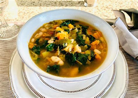 Simmer, covered, until escarole has wilted, about 10 minutes. What's Cookin'? Patty's Tuscan White Bean Soup RECIPE