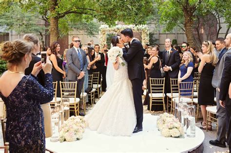 Bride And Groom Share Ceremony Kiss