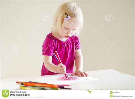 Simple cat drawing cute easy drawings art drawings for kids cute kawaii drawings doodle drawings drawing for kids. Cute Toddler Girl Drawing With Colorful Pencils Stock ...