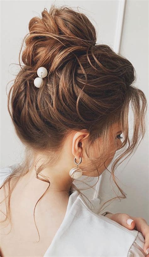 updo hairstyles for your stylish looks in 2021 brunette textured high bun