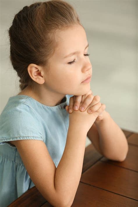 Cute Little Girl Praying At Home Stock Photo Image Of Cute