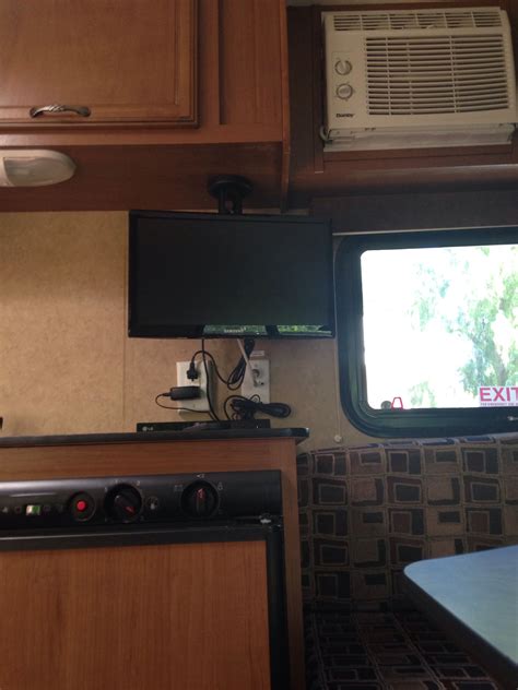 Maybe you would like to learn more about one of these? Under cabinet mount for TV small space solution | Small ...