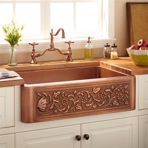 Also, the double sink helps us to work fast, and it matches perfectly with the faucets. 33" Vine Design Copper Farmhouse Sink - Kitchen