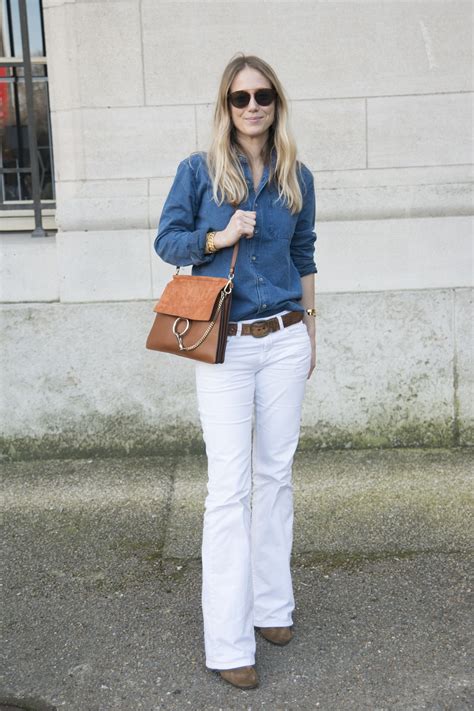 How To Wear Flared Jeans Glamour