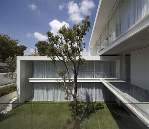 Minimal House With Hangar Style Rear Facade