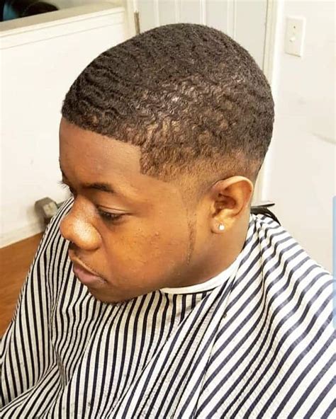 11 Attractive Temp Fade Hairstyle With Waves And Dreads For Men