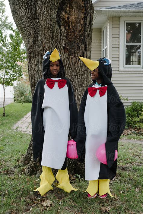 Two Black Girls In Penguin Costumes By Stocksy Contributor Gabi