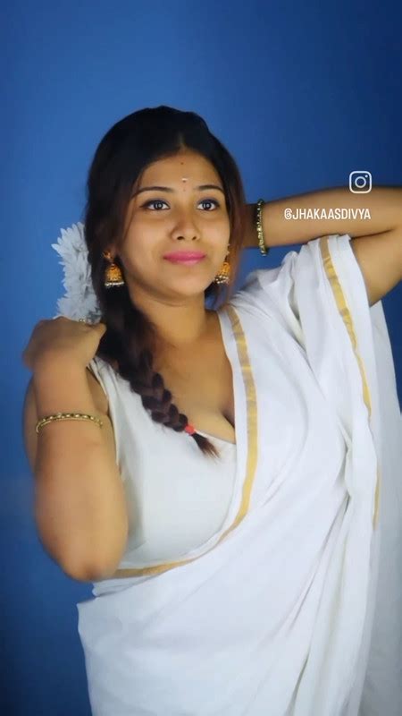 busty desi girl huge tits in white saree