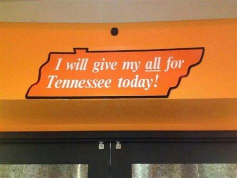 A Sign That Says I Will Give My All For Tennessee Today On An Orange Wall