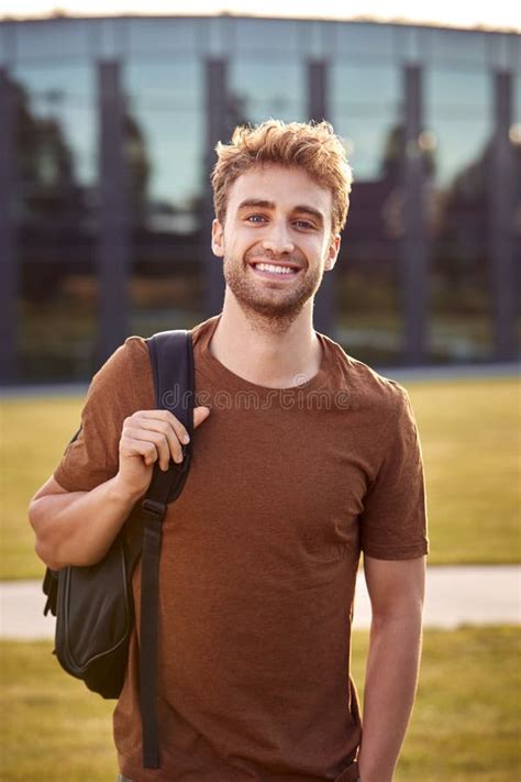 Portrait Of Male University Or College Student Standing Outdoors By
