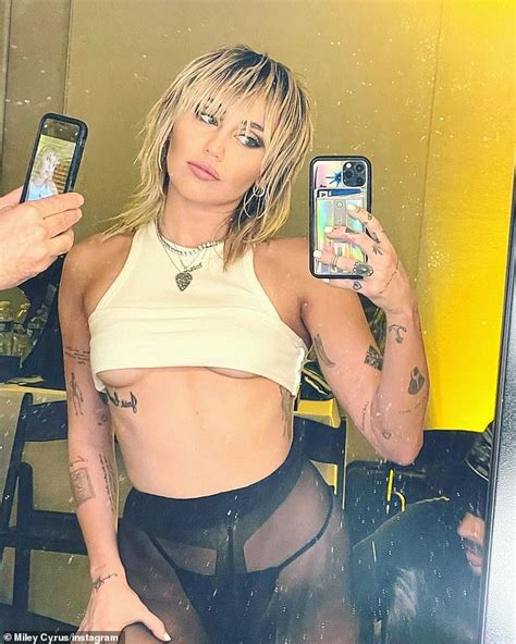 Miley Cyrus Flashes Under Boob In Latest Slew Of Very Racy Photos