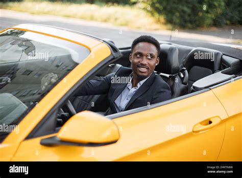 Car Side Window Young Handsome Bearded African Businessman Driver
