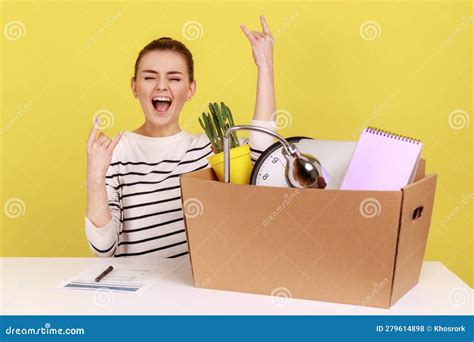 Woman with Cardboard Box with Her Things and Yelling, Showing Victory