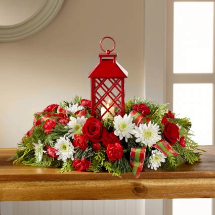 Now a days, christmas flower centerpieces are very much in use. FTD Celebrate The Season Centerpiece Christmas arrangement ...