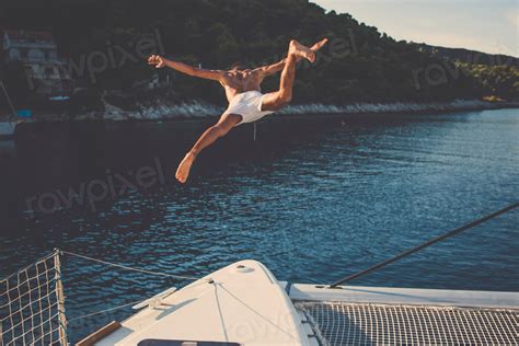 Free Man Jumping Sea Boat Free Photo Rawpixel