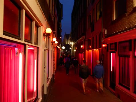 a street scene in the famous red light district of amsterdam the netherlands smithsonian