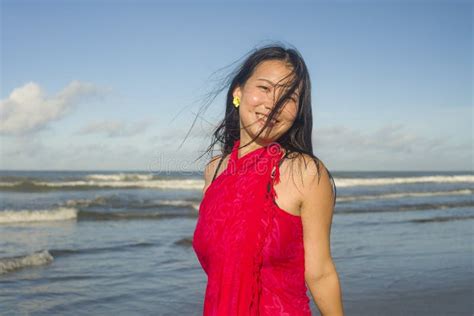 Young Sweet And Happy Asian Korean Woman In Sarong At Beautiful Beach