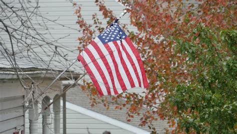 American Flag Blowing Wind During Fall Stock Footage Video 100