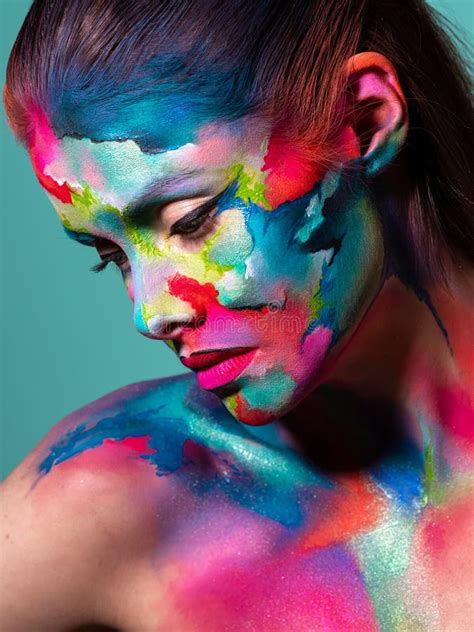 Face Art And Creative Makeup A Young Beautiful Woman Abstract Art On