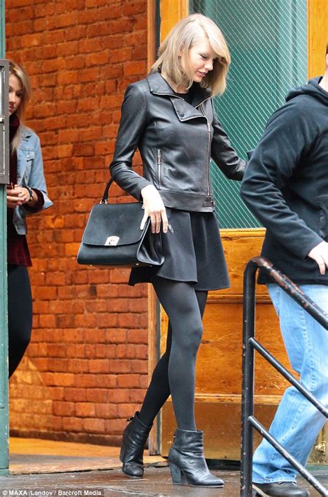 Taylor Swift Looks Gorgeous In Edgy Leather Jacket And Mini Skirt Daily Mail Online