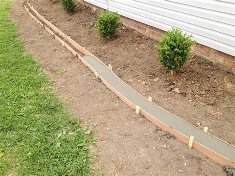 Fill the trench with coarse bedding sand, leaving enough depth for the pavers, and rake smooth. How to Make a Concrete Landscape Curb --In 4 Easy Steps! - Modern Design in 2020 | Landscape ...