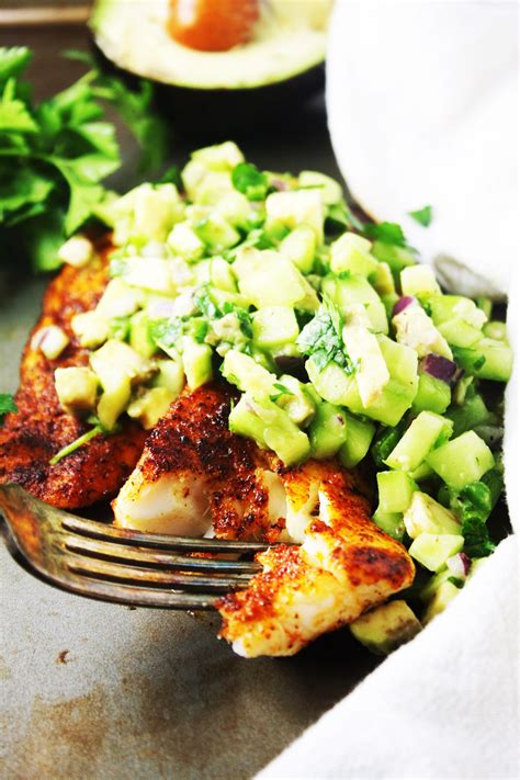 This version of blackened tilapia is baked in the oven instead of searing on the stovetop. Blackened Tilapia with Cucumber Avocado Salsa [21 Day Fix ...