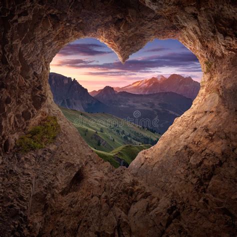 View From Heart Shape Cave To The Idyllic Mountain Scenery Stock Image