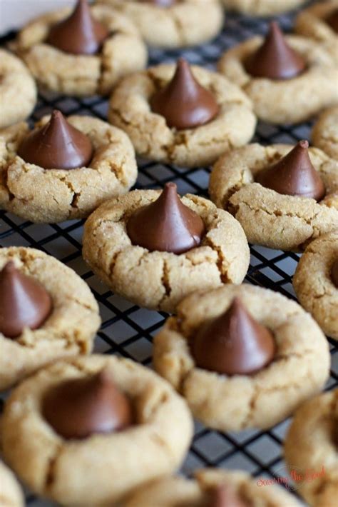Thumbprint cookies are always a hit come christmastime, and these dreamy, melt in your mouth peanut butter cookies with a kiss inside are no these are the very best hershey kiss cookies, and this recipe always yields a soft and chewy peanut butter cookie perfect for topping with a. Peanut Butter Blossom Cookie Recipe | Savoring The Good