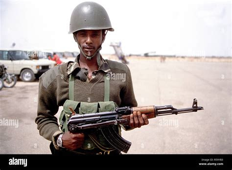 A Somalia Soldier Armed With A Soviet Designed Akm Assault Rifle