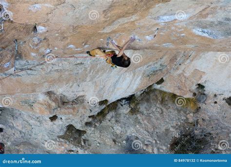 Rock Climber Professional Athlete Climbing In The Mountains Extreme