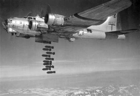 B 17 Dropping Bombs On A Bombing Mission Ww Ii Photograph By L Brown