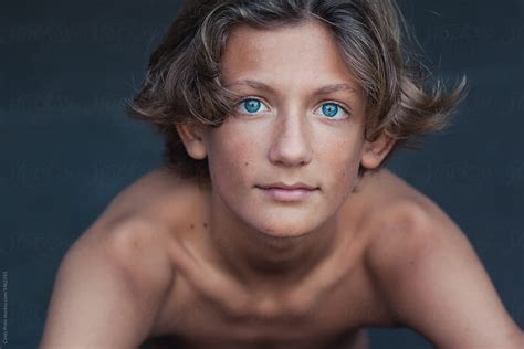 Bare Chested Blue Eyed Teen Portrait In Summer By Cindy Prins