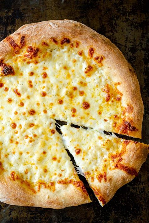 Pour a 1/4 cup of sauce in the center and spread it around evenly. Hands down the best homemade Pizza Dough! Make a New York ...