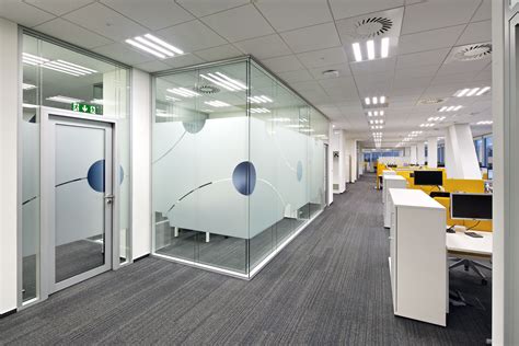 Stunning works of art captured in glass, create obscurity where needed. Entrance area #entrance#reception#glass#partitions | Nasa