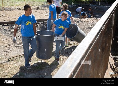 Volunteers Clean Up Vacant Lot Stock Photo Alamy