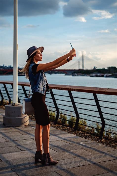 Girl Taking Selfie By The River Stock Image Image Of Holding Caucasian 76584895