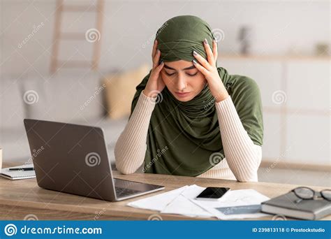 Deadline Stress Exhausted Young Arab Woman In Hijab Tired After
