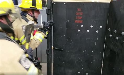 watch duluth firefighters practice forcible entry