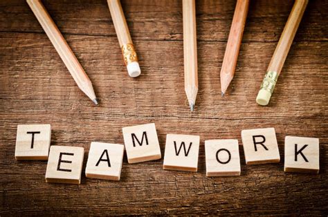 Teamwork Word Written On Wood Block With Wood Pencils Stock Image