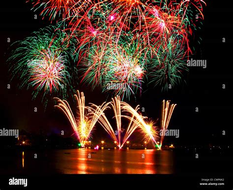 Fireworks Over Water Stock Photo Alamy