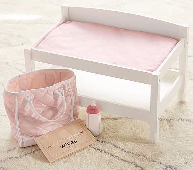 I'm partnering with pottery barn to share their fair trade certified products, which are produced in factories that ensure fair and safe labor practices. Doll Changing Table | Pottery Barn Kids