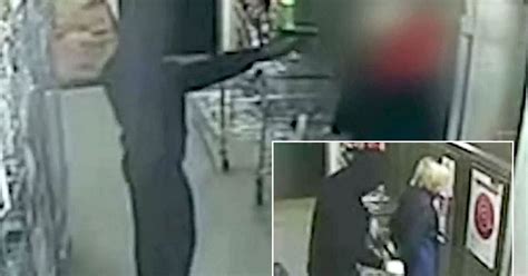 Caught On Cctv Masked Robbers Push Guns Against Shop Workers Heads During Terrifying Raid
